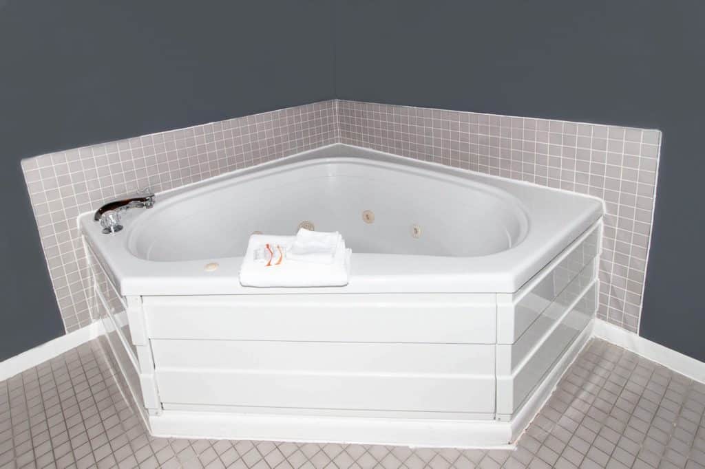 Honeymoon Suite with Jet Tub jet tub in hotel room