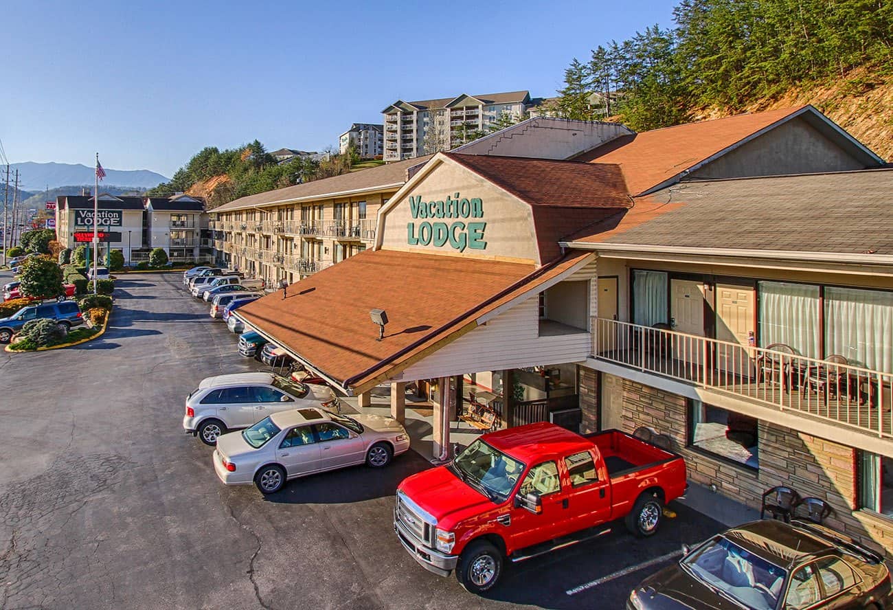 Cars line the parking lot at the Vacation Lodge, the premier hotel in Pigeon Forge