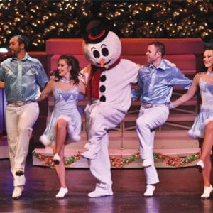 Frosty the Snowman dancing with the Country Tonite cast